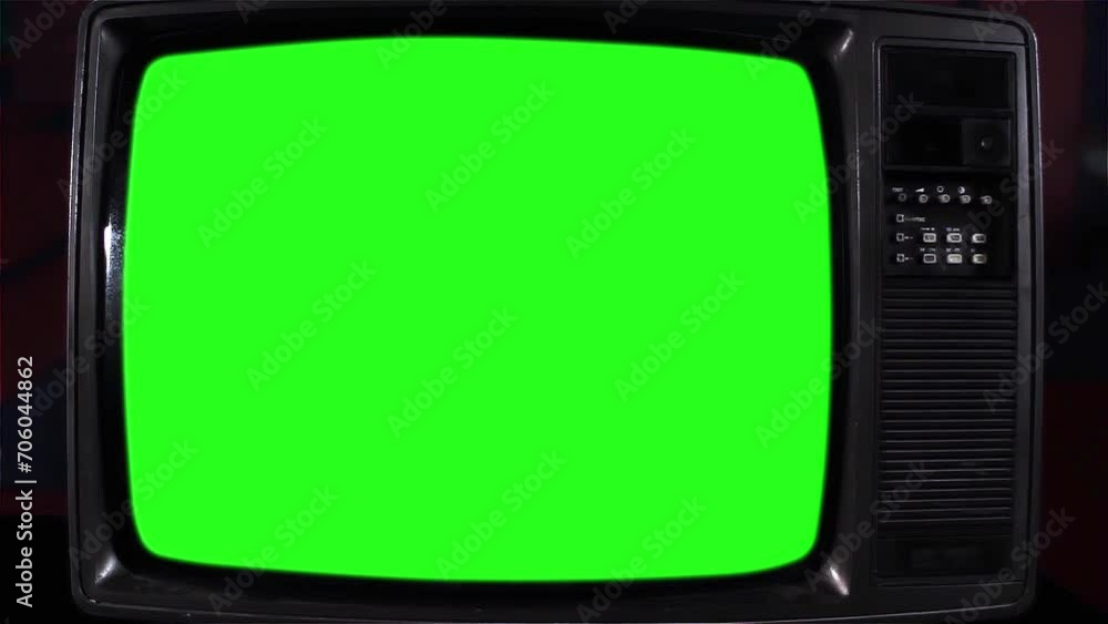 Wall mural old television turning on chroma key green screen with static noise. you can replace green screen wi