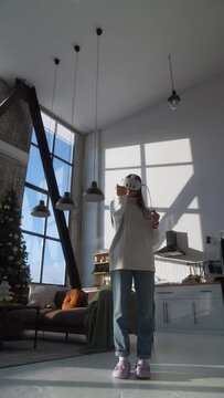 A sunny Christmas setting: a vibrant young lady immersed in a VR experience.