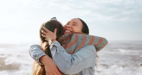 Love, happy or friends hug at a beach on holiday vacation for bonding or support together in summer. Excited young women, smile or gen z people outdoors at sea with freedom, diversity or wellness