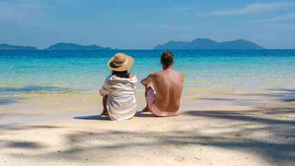 Fototapeta na wymiar Koh Wai Island Thailand tropical Island near Koh Chang, couple of men and woman on the beach