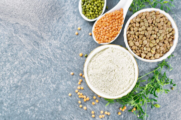 Fototapeta na wymiar Flour lentil in bowl on granite top