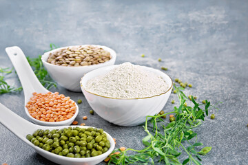 Flour lentil in bowl on stone table