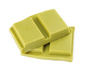 Pieces of tasty matcha chocolate bar isolated on white