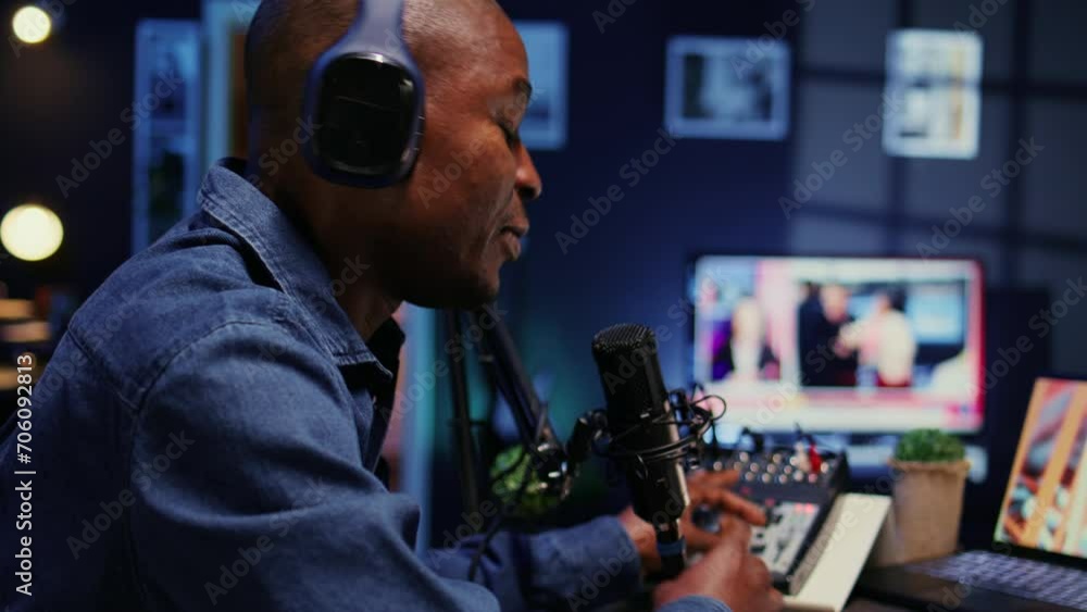 Poster african american show host recording podcast with guest, using analog mixer and professional mic in 