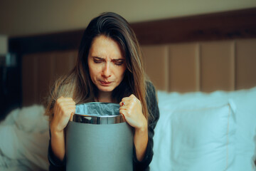 Sick Woman Feeling Nauseated in the Morning at Home. Pregnant girl suffering from morning sickness...