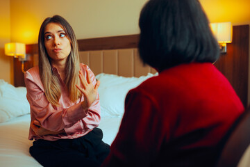 Woman Pushing away on her Mother Life Advice. Daughter setting boundaries with her close relative...
