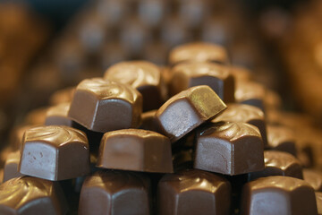 dark chocolate on a plate on table close up 