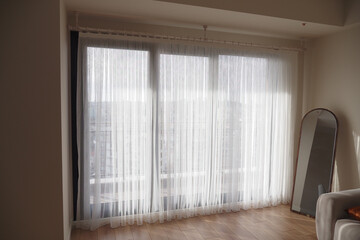  white clean fabric curtain in a living room 
