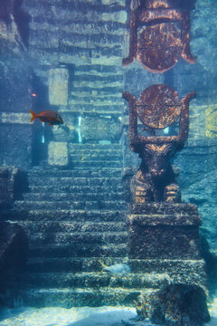 Underwater Ancient Staircase and Anchors with Tropical Fish