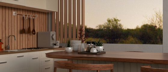 Interior design of a modern, Scandinavian kitchen with a beautiful hardwood dining table.