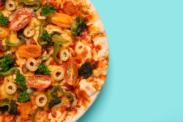Vegetable pizza on blue background