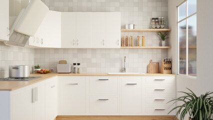 A modern, Scandinavian kitchen with white wall cabinets and counters and tiles wall.