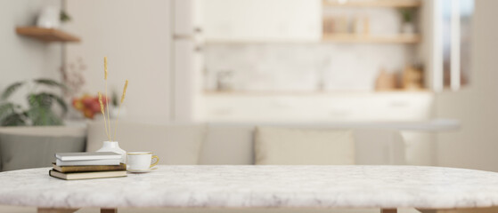 Close-up image of a copy space on a white marble coffee table in a modern bright living room.
