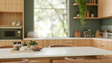 Copy space for displaying your product on a dining table in a modern green and wood kitchen.