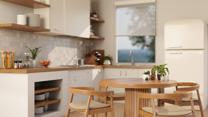 A modern white Scandinavian kitchen with wood dining table, cooking space, and kitchen appliances.