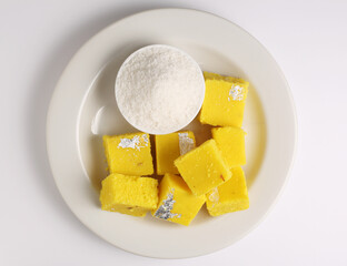 Coconut burfi - indian popular sweet made up of coconut, milk and sugar