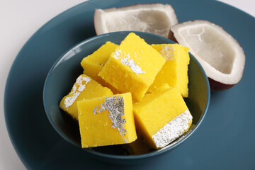 Coconut burfi - indian popular sweet made up of coconut, milk and sugar