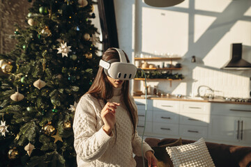 A vibrant young woman in a virtual reality headset on a sunny winter morning.