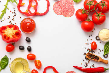 Frame made of fresh ingredients for preparing pizza on white background