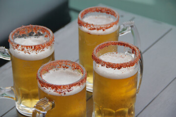 Michelado Rhythm: Four beer Glasses, One Enchantment