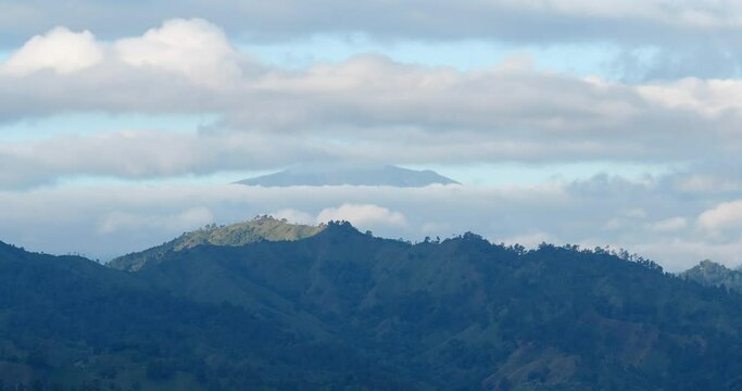 Beautiful view of mountain peak in clouds. 