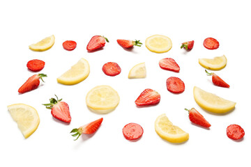Slices of strawberry and lemon for preparing lemonade on white background