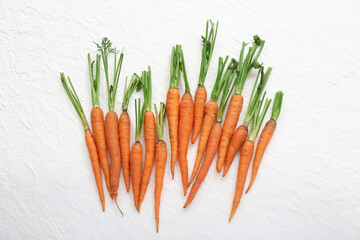 Many fresh carrots on white background
