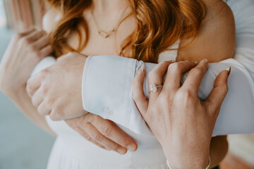 close up of a person holding their hands