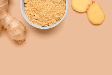 Fresh ginger root and bowl with dried powder on orange background