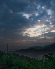 view of the hills in the morning with dew