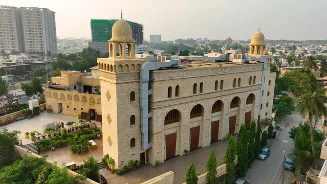 Beautiful drone shot sideview of Al Masjid Al Burhani during sunny day in Karachi, Pakistan.