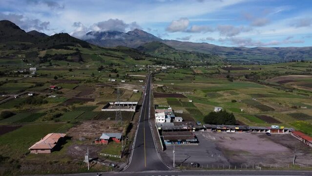 El Chaupi village to Los Illinizas volcano mountains drone follows road