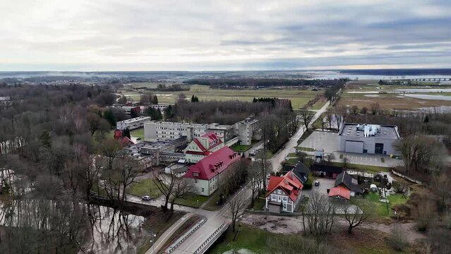 Drone orbit establishes hospital in rural town of Silute Lithuania in winter
