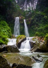 Naklejka premium two twin waterfalls with beauty