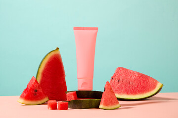 A stack of watermelon round slices with unbranded tube standing on top. Watermelon contains vitamin...