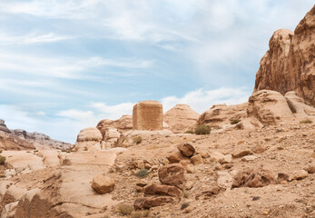 Fototapeta premium Guardian stones of Djinn blocks on the outskirts of the capital of the Nabatean kingdom of Petra at the beginning of the tourist route in the city of Wadi Musa in Jordan