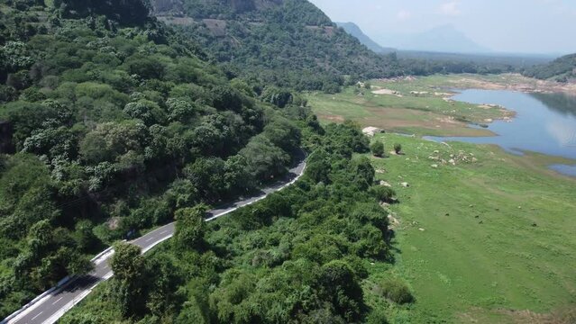 Drone shot of Pollachi Valparai road near Aliyar Reservoir and dam, Coimbatore, Tamil Nadu, South India