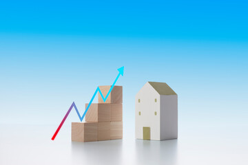 Evaluating and forecasting the added value of real estates business..Hand put the wooden block is...