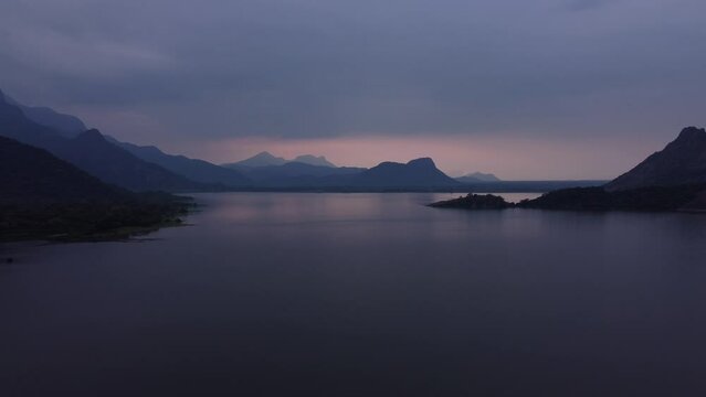 Scenic drone shot of Palar Dam Reservoir at sunset
