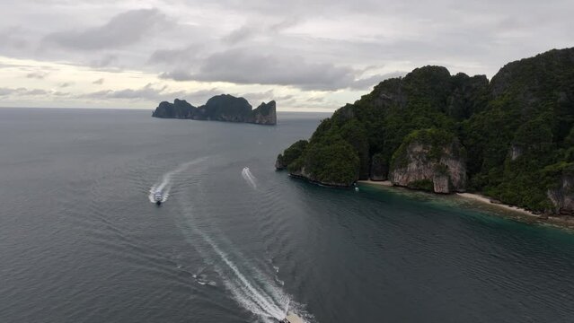 Drone footage from PhiPhi islands in Thailand footage of incredible Thai landscapes incredible nature with insane rocks, beaches, hills, ocean adn boats. Footage. filmed in 4k