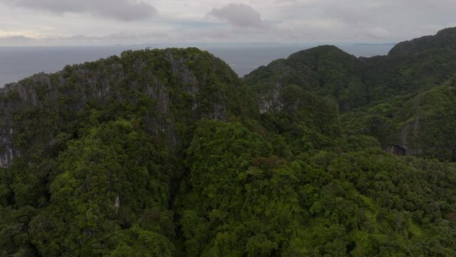 Drone footage from PhiPhi islands in Thailand footage of incredible Thai landscapes incredible nature with insane rocks, beaches, hills, ocean adn boats. Footage. filmed in 4k