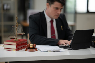 Partner lawyers or attorneys discussing a contract agreement. Successful businessmen have a contract in place to protect it,signing of modest agreements form in office...