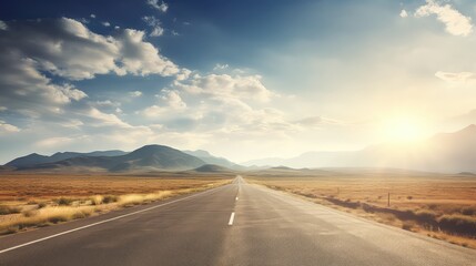 Naklejka premium Asphalt road in the mountains under the blue sky with clouds.