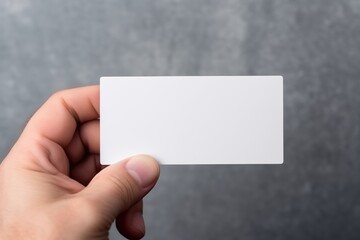 a person holding a small business card mockup