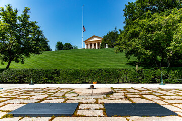 The tomb of President John F. Kennedy with the eternal flame at the Arlington National Military...