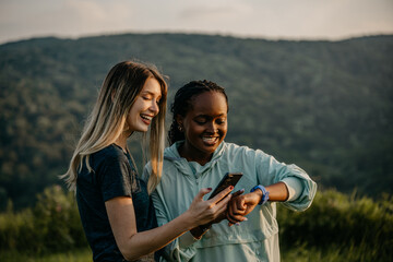  Women of different body types jogging and monitoring their performance with smart technology.