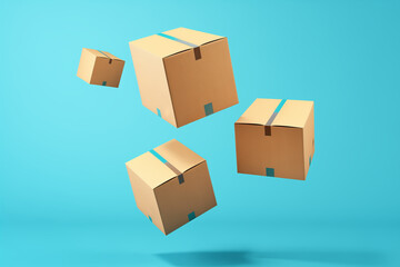 Fototapeta premium Pile of various size taped up cardboard boxes isolated on turquoise blue background.