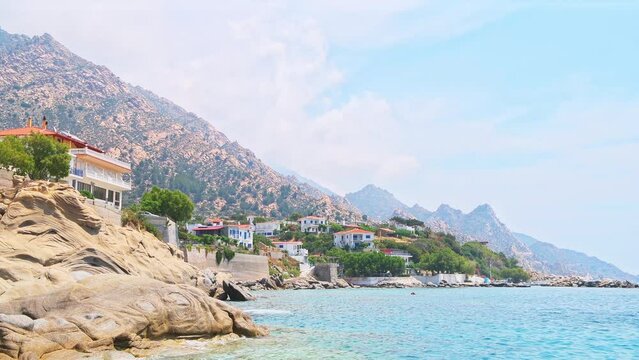 Karkinagri village cityscape harbor marina coast on Ikaria island, Greece Greek longevity blue zone
