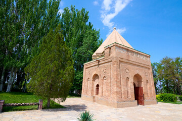 Fototapeta na wymiar The mausoleum of Babaja Khatun. The mausoleum of Babaja Khatun is located in the Zhambyl region of Kazakhstan. The mausoleum is located in close proximity to the Aisha Bibi mausoleum.