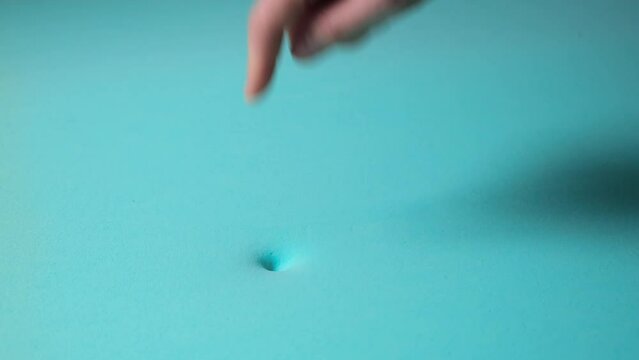 Person's hand presses on memory foam mattress. Shape restoration. It's a soft layer of bed. Elastic foam rubber, polyurethane foam material. Good sleep concept. Comfort and body care. High quality 4k